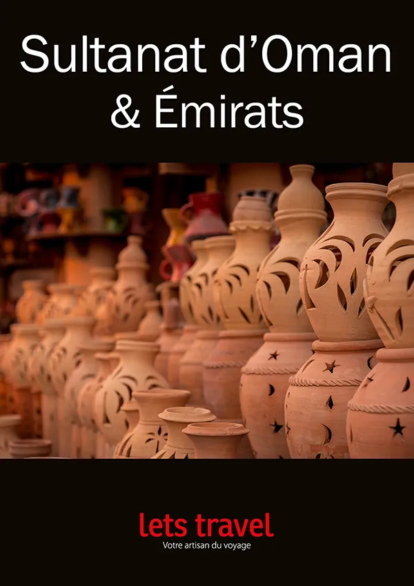 Vases en terre cuite, Oman — artisanat traditionnel aux motifs enchanteurs et colorés.